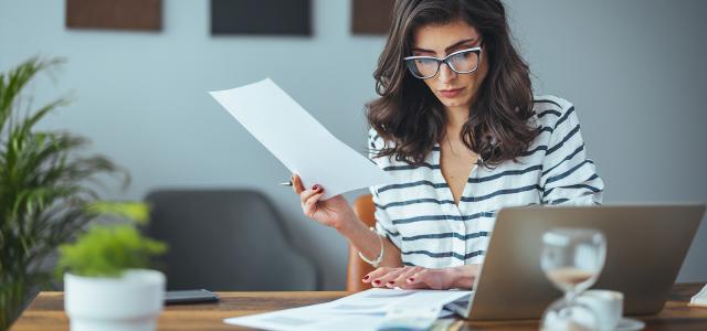 Woman reviewing paperwork